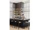 Modern bar area with stylish seating and a fully stocked display at 1133 14Th St # 3320, Denver, CO 80202