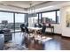 Dining area featuring floor-to-ceiling windows with skyline views at 1133 14Th St # 3320, Denver, CO 80202