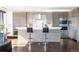 Modern kitchen with stainless steel appliances, hardwood floors, and a bar at 1133 14Th St # 3320, Denver, CO 80202