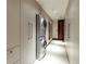Convenient laundry room features modern washer and dryer units and ample storage cabinetry at 1133 14Th St # 3320, Denver, CO 80202