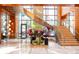 Grand lobby entrance featuring a staircase and floral arrangements at 1133 14Th St # 3320, Denver, CO 80202