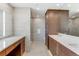 Sleek bathroom with double vanity, walk-in shower, and modern fixtures at 1133 14Th St # 3320, Denver, CO 80202