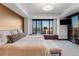 Bright bedroom with expansive city views, comfortable seating, and modern interior design at 1133 14Th St # 3320, Denver, CO 80202