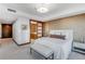 Elegant main bedroom featuring neutral tones, contemporary lighting, and a walk-in closet at 1133 14Th St # 3320, Denver, CO 80202