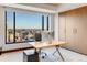 Bright office featuring a large window with a city view and custom built-in storage at 1133 14Th St # 3320, Denver, CO 80202