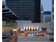 Rooftop pool area with stylish lounge seating and city skyline views at 1133 14Th St # 3320, Denver, CO 80202