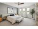 Serene bedroom with neutral tones, a comfortable bed, and an abundance of natural light at 2966 Casalon Cir, Superior, CO 80027