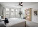 Serene bedroom with neutral tones, a comfortable bed, and an abundance of natural light at 2966 Casalon Cir, Superior, CO 80027