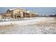 Lovely townhome with stone accents, private balconies, and snow covered landscape at 2966 Casalon Cir, Superior, CO 80027