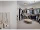 Spacious walk-in closet with custom shelving and ample storage for clothing and accessories at 2966 Casalon Cir, Superior, CO 80027