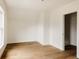 Bright bedroom with a large window offers natural light and ample open space at 940 N Ogden, Denver, CO 80218