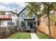 Charming two-story home with an expansive green lawn at 940 N Ogden, Denver, CO 80218