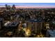 An impressive nighttime aerial view showcases the building's location and the city's vibrant skyline at 800 N Pearl St # 1203, Denver, CO 80203