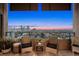 Relaxing balcony with city views, features cozy seating, and ample space for enjoying the outdoors at 800 N Pearl St # 1203, Denver, CO 80203