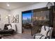 Living area with an expansive balcony offering breathtaking city skyline views at 800 N Pearl St # 1203, Denver, CO 80203