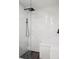 Modern bathroom featuring a glass-enclosed shower with black fixtures and a built-in bench at 800 N Pearl St # 1203, Denver, CO 80203