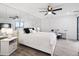 Serene bedroom with a mirrored wall, modern furniture, and abundant natural light at 800 N Pearl St # 1203, Denver, CO 80203