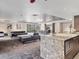 Spacious clubhouse with modern sofas, seating, tables, and a marble island with kitchen appliances at 800 N Pearl St # 1203, Denver, CO 80203