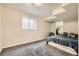 Basement bedroom featuring carpet, a window, and closet at 1946 Ensenada St, Aurora, CO 80011