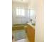 Compact bathroom with a shower-tub combo and vintage green fixtures for a classic design at 15065 Huron St, Broomfield, CO 80023