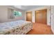 Bedroom with a window and closet. Good natural light at 15065 Huron St, Broomfield, CO 80023