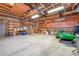 Spacious garage with ample workspace, shelving, and room for equipment at 15065 Huron St, Broomfield, CO 80023