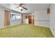 Spacious living room featuring neutral walls and views of the serene outdoor landscape at 15065 Huron St, Broomfield, CO 80023
