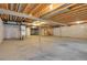 Unfinished basement space offering potential for customization and expansion to suit your needs at 16076 Columbine Pl, Thornton, CO 80602