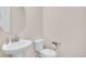 Powder room featuring pedestal sink, and updated fixtures at 16076 Columbine Pl, Thornton, CO 80602