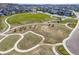 Manicured community green space with walking paths for residents to enjoy at 21893 E Tufts Cir, Aurora, CO 80015