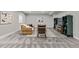 Relaxing living room with neutral carpet, a leather sofa and media center at 21893 E Tufts Cir, Aurora, CO 80015