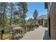 Deck with seating area and mountain views at 322 Greystone Rd, Evergreen, CO 80439