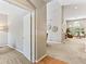 Open-concept living room with lots of natural light and neutral-colored walls, seamlessly flowing layout at 1836 S Kendall Ct, Lakewood, CO 80232