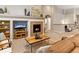 Inviting living room showcasing a fireplace with decorative mantel and open layout at 1836 S Kendall Ct, Lakewood, CO 80232