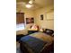 Bright bedroom featuring unique decorations, a cozy bed, and a ceiling fan at 12714 Leyden St # C, Thornton, CO 80602
