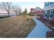 Attractive home exterior with a well-maintained lawn and sidewalk at 12714 Leyden St # C, Thornton, CO 80602