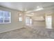 This finished basement is equipped with a walkout and a bar at 7036 Orion Ln, Arvada, CO 80007