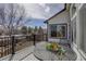 Outdoor deck area with furniture and view overlooking neighborhood at 7036 Orion Ln, Arvada, CO 80007