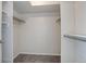 Spacious walk-in closet with ample shelving and storage, offering a practical and organized solution at 7036 Orion Ln, Arvada, CO 80007