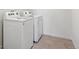 Laundry area with side-by-side washer and dryer at 27554 E Byers Ave, Aurora, CO 80018