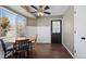 Breakfast nook with bright window and view to the backyard at 10407 Strasburg Way, Parker, CO 80134