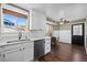 Stylish kitchen with stainless steel appliances, ample counter space, and a breakfast nook at 10407 Strasburg Way, Parker, CO 80134