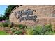 Heather Gardens community sign landscaped with colorful vegetation at 3144 S Wheeling Way # 106, Aurora, CO 80014