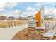 Orion Park features stone signage and manicured landscaping in a residential neighborhood at 27957 E 9Th Dr, Aurora, CO 80018