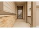 Front entrance with a security door and stone accents at 27957 E 9Th Dr, Aurora, CO 80018
