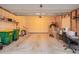Spacious two car garage with room for storage and equipped with overhead lighting at 27957 E 9Th Dr, Aurora, CO 80018