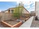 Backyard gardening space featuring organized raised garden beds at 27957 E 9Th Dr, Aurora, CO 80018