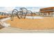 The community's spiderweb climber provides hours of fun for neighborhood children at 27957 E 9Th Dr, Aurora, CO 80018