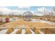 A neighborhood park features a climbing structure with mulch and native grasses at 27957 E 9Th Dr, Aurora, CO 80018
