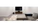 Finished basement with home theater setup and comfortable seating at 9392 Anvil St, Arvada, CO 80007